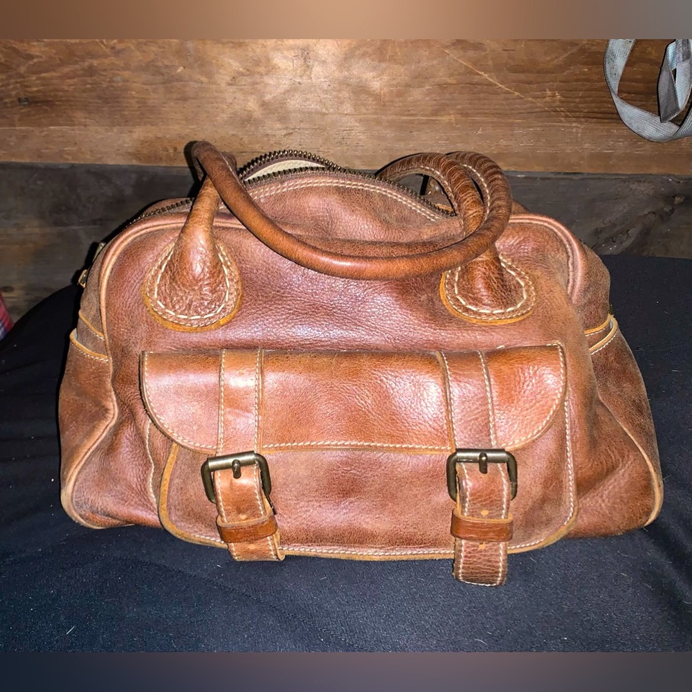 Roots authentic leather purse